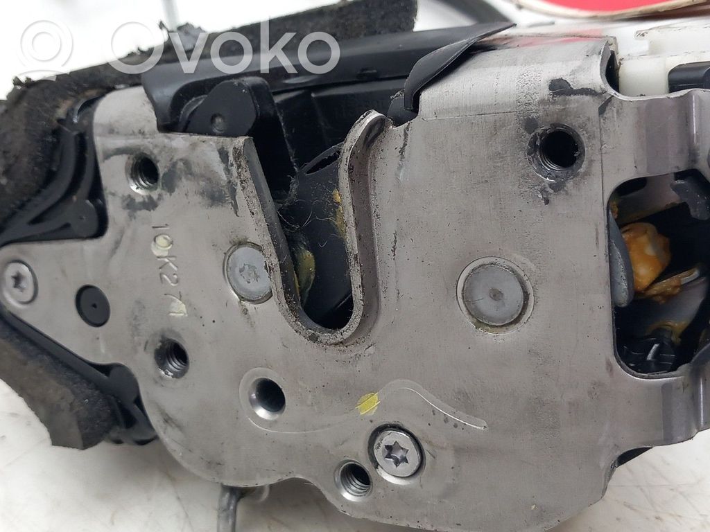 Opel Astra J Zamek drzwi przednich 