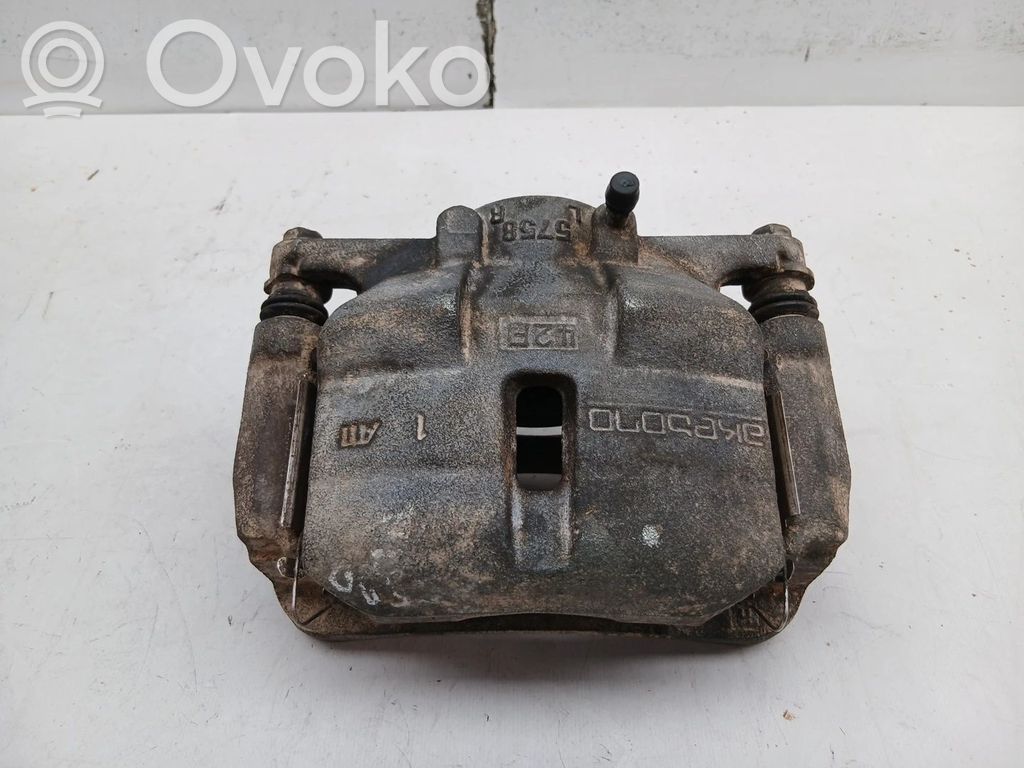 Nissan Qashqai Zacisk hamulcowy przedni 