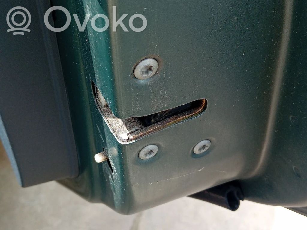 Cerradura de puerta trasera