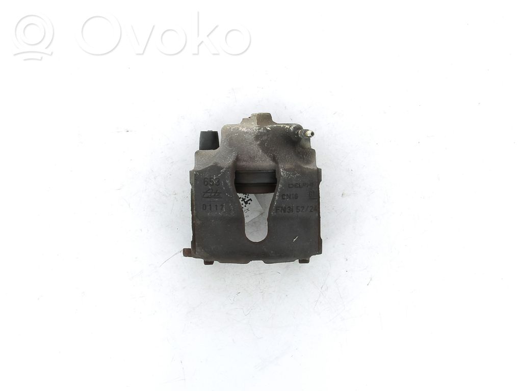 Opel Astra G Zacisk hamulcowy przedni 
