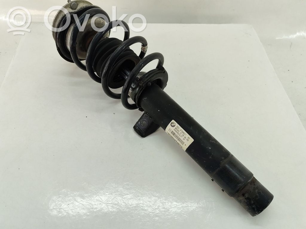 BMW X1 E84 Etuiskunvaimennin kierrejousella 