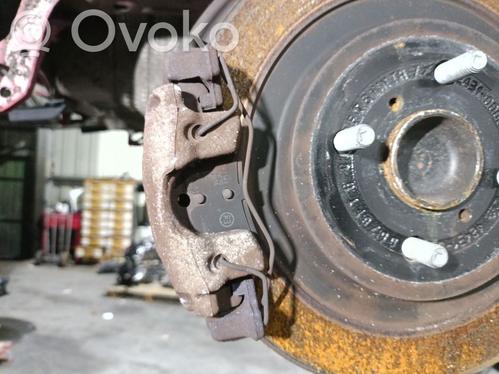 Toyota Yaris Mocowanie / Zacisk hamulca tylnego 