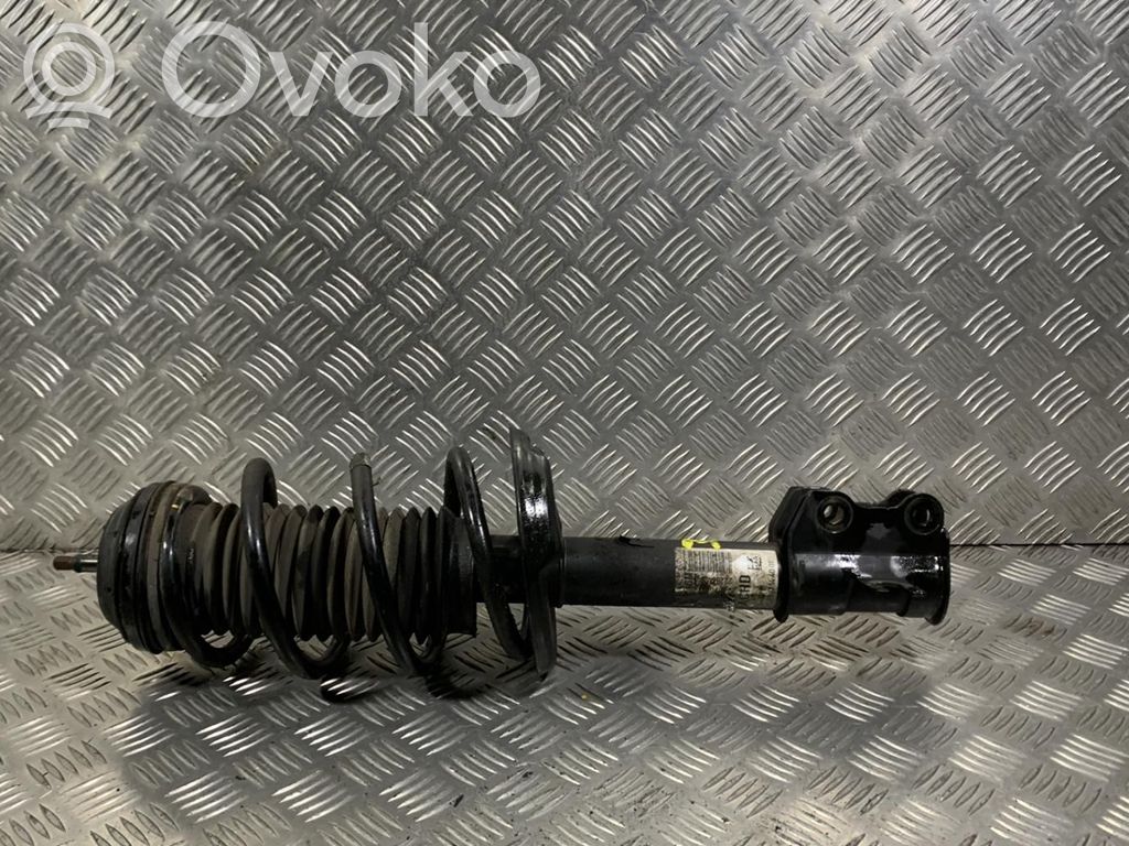 Opel Corsa E Amortyzator osi przedniej ze sprężyną 