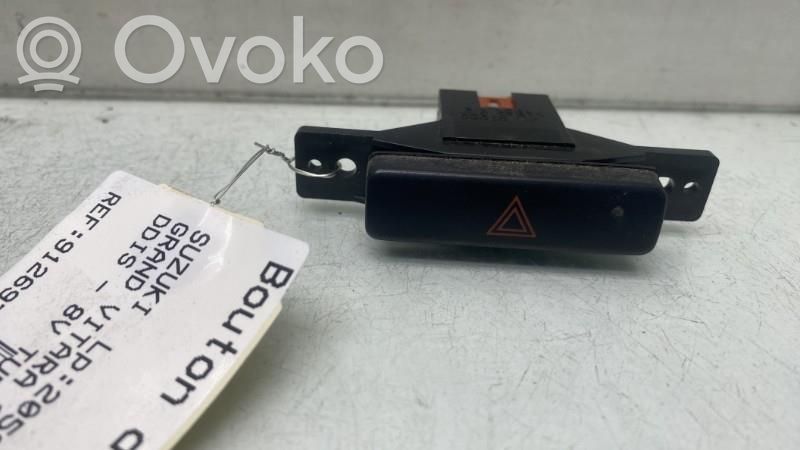 Suzuki Grand Vitara II Botón interruptor de luz de peligro 