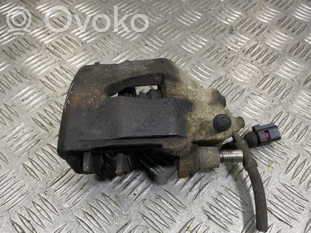 Volkswagen Golf VI Zacisk hamulcowy przedni