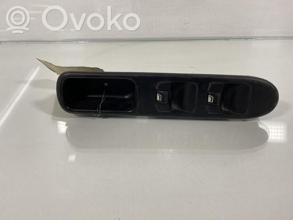 Electric window control switch   6554E9