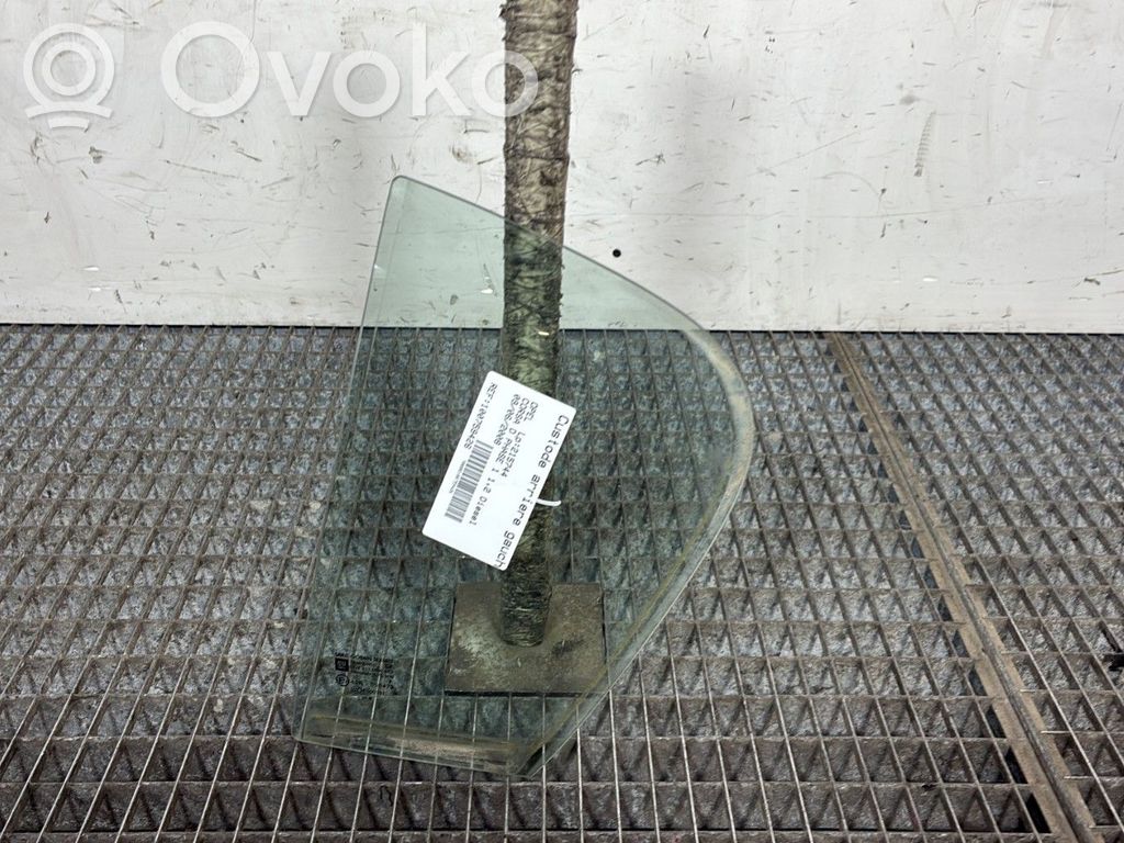 Opel Corsa D Ventanilla de ventilación de la puerta trasera 