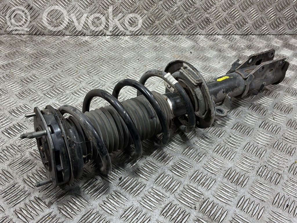 Ford Puma Front shock absorber with coil spring 