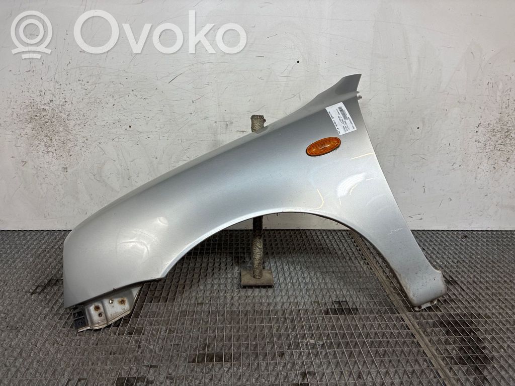 Nissan Micra Błotnik przedni 