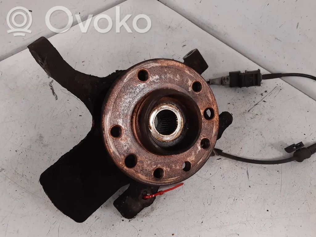 Opel Astra H Zwrotnica koła przedniego 