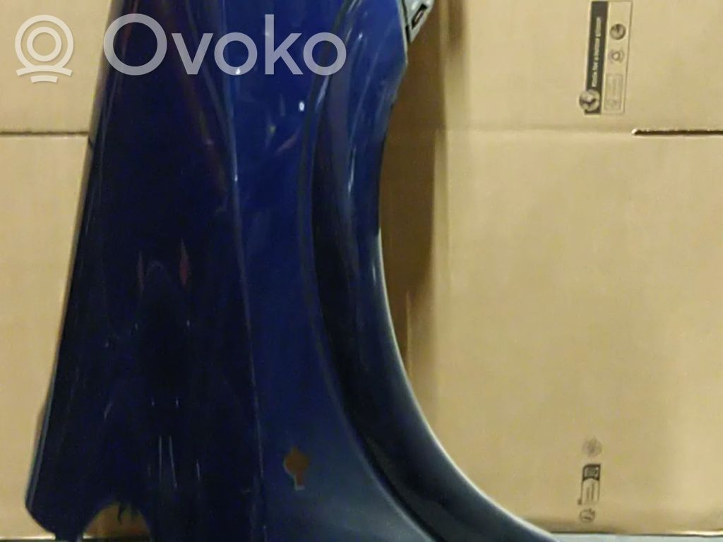 Opel Zafira A Błotnik przedni 