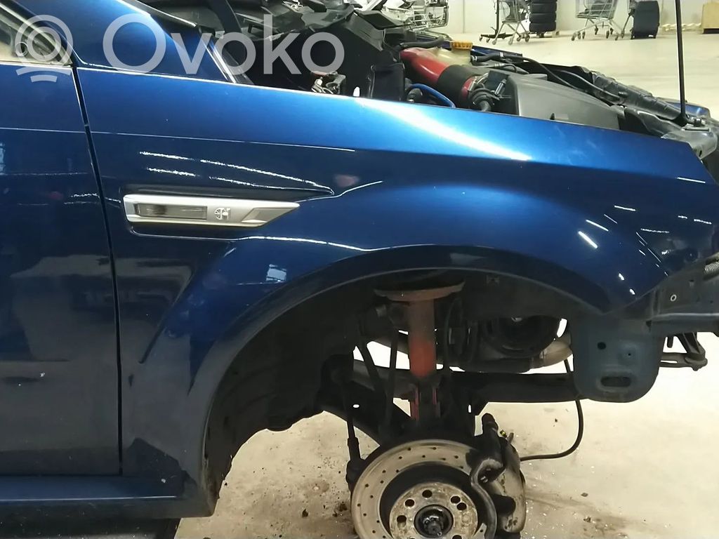 Opel Tigra B Błotnik przedni 