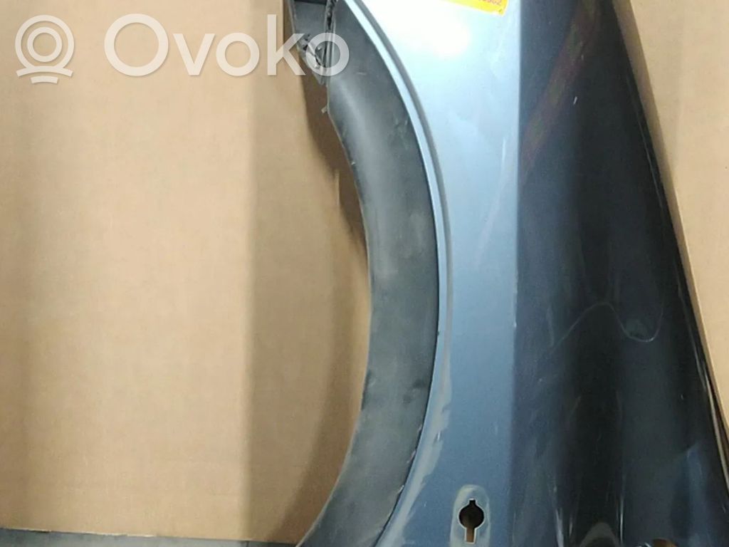 Opel Zafira A Błotnik przedni 