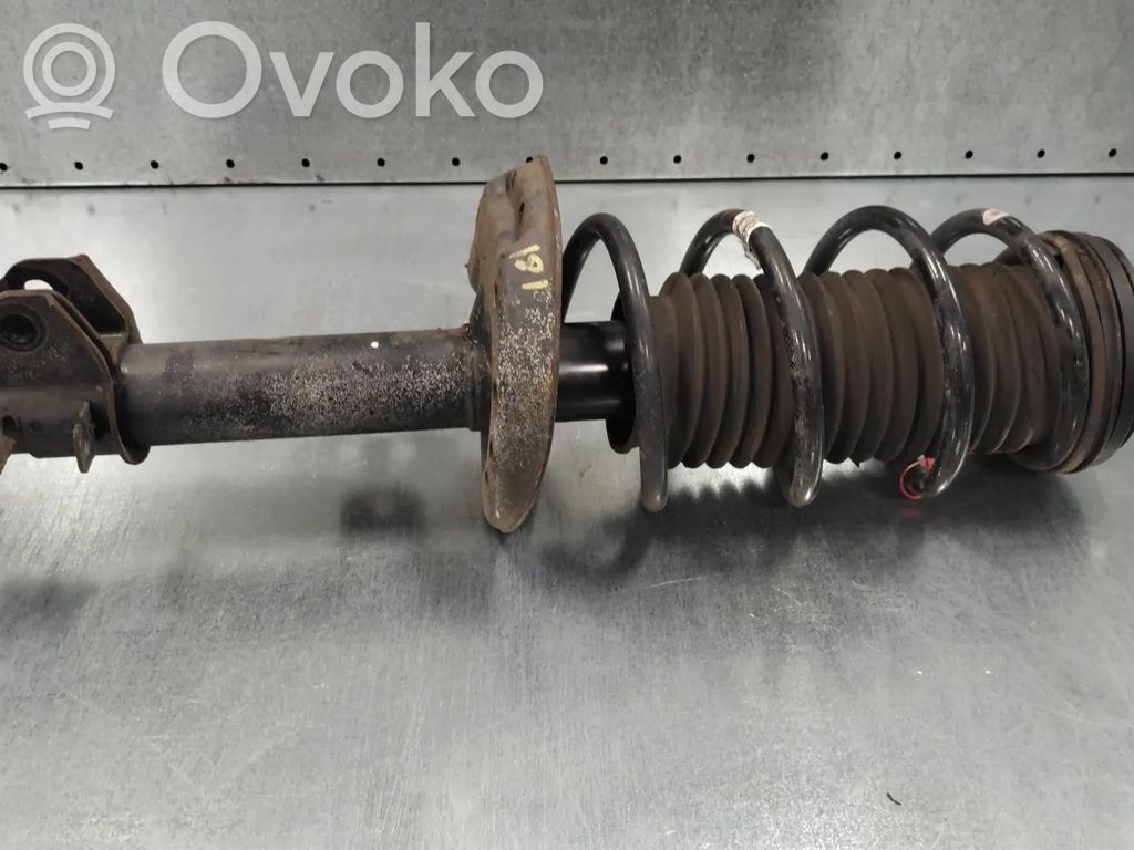 Opel Corsa D Priekšpusē amortizators 