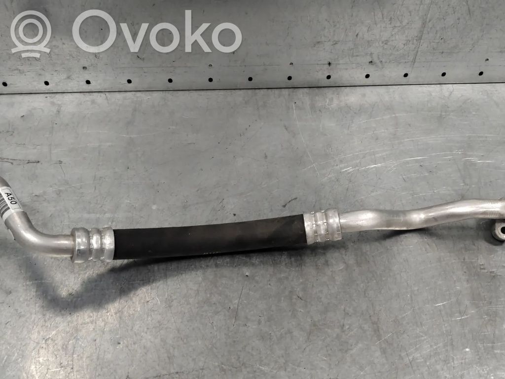 Ilmastointilaitteen putki (A/C)   97763CV910