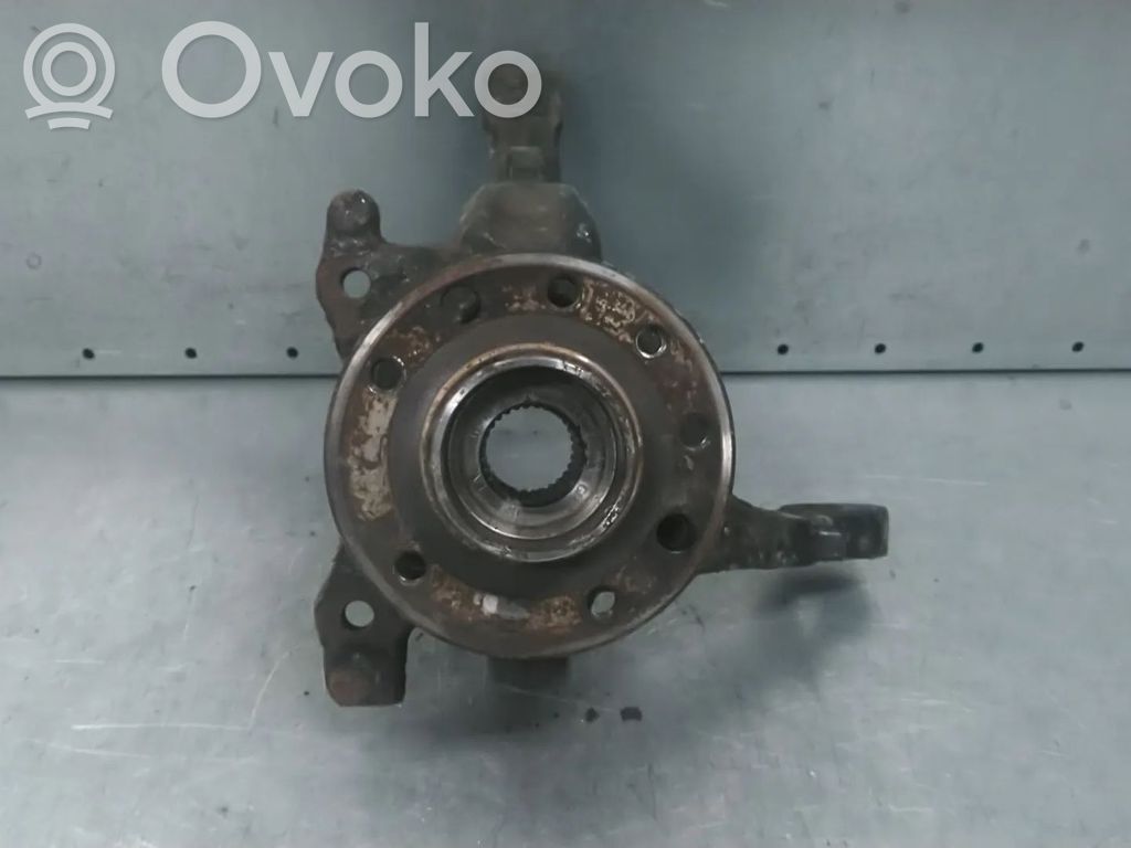 Opel Astra H Zwrotnica koła przedniego 