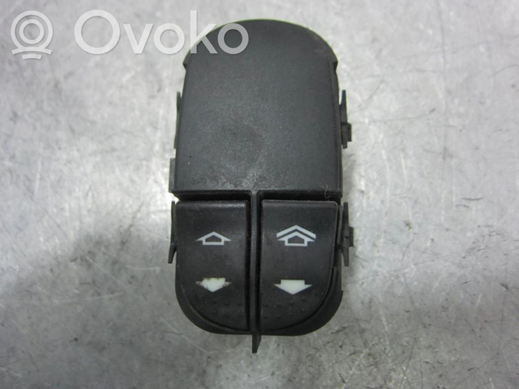 Electric window control switch   YS4T14529AA