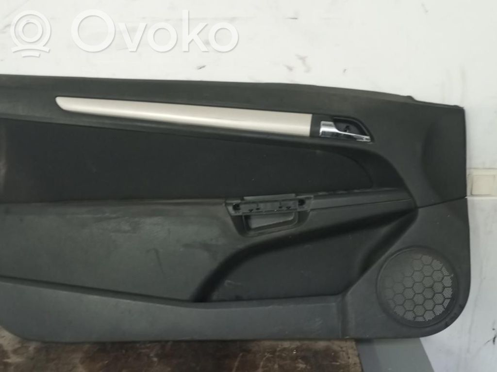 Opel Astra H Garniture de panneau carte de porte avant 