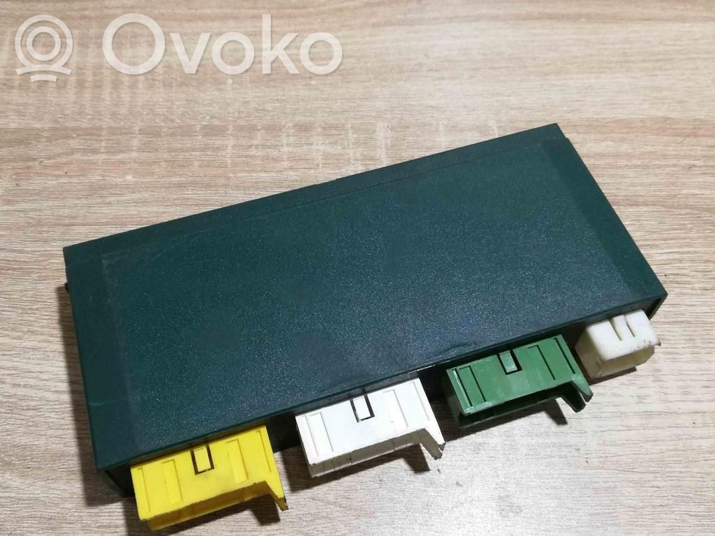 BMW 5 E34 Komforto modulis 