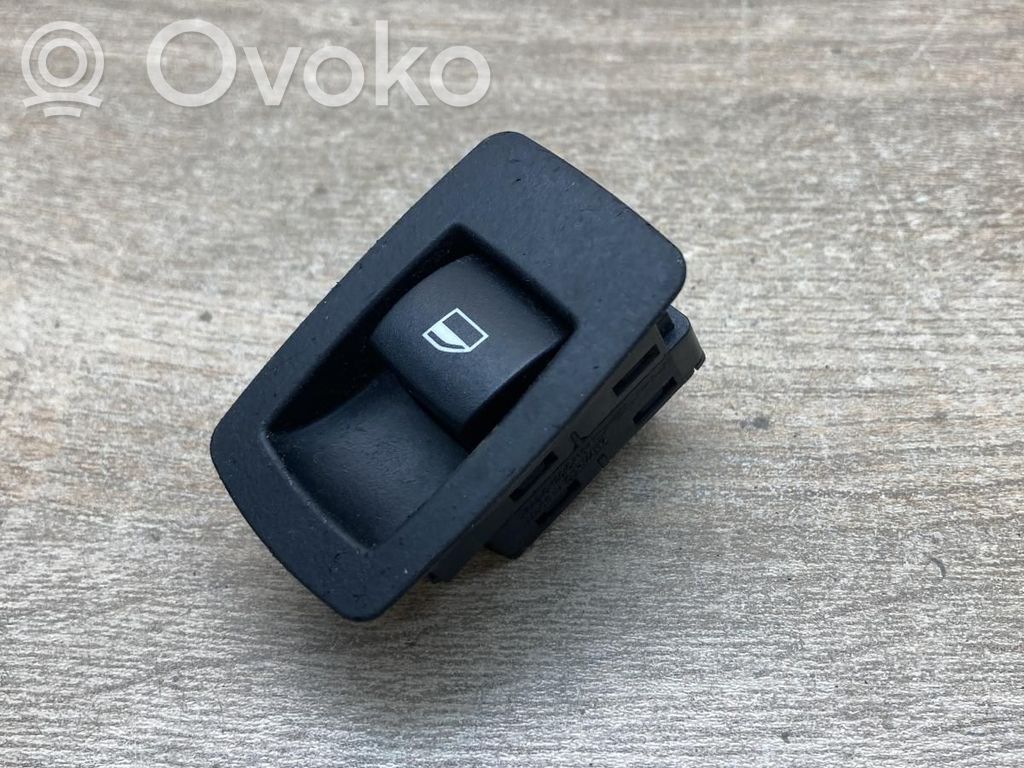 Electric window control switch   6952001