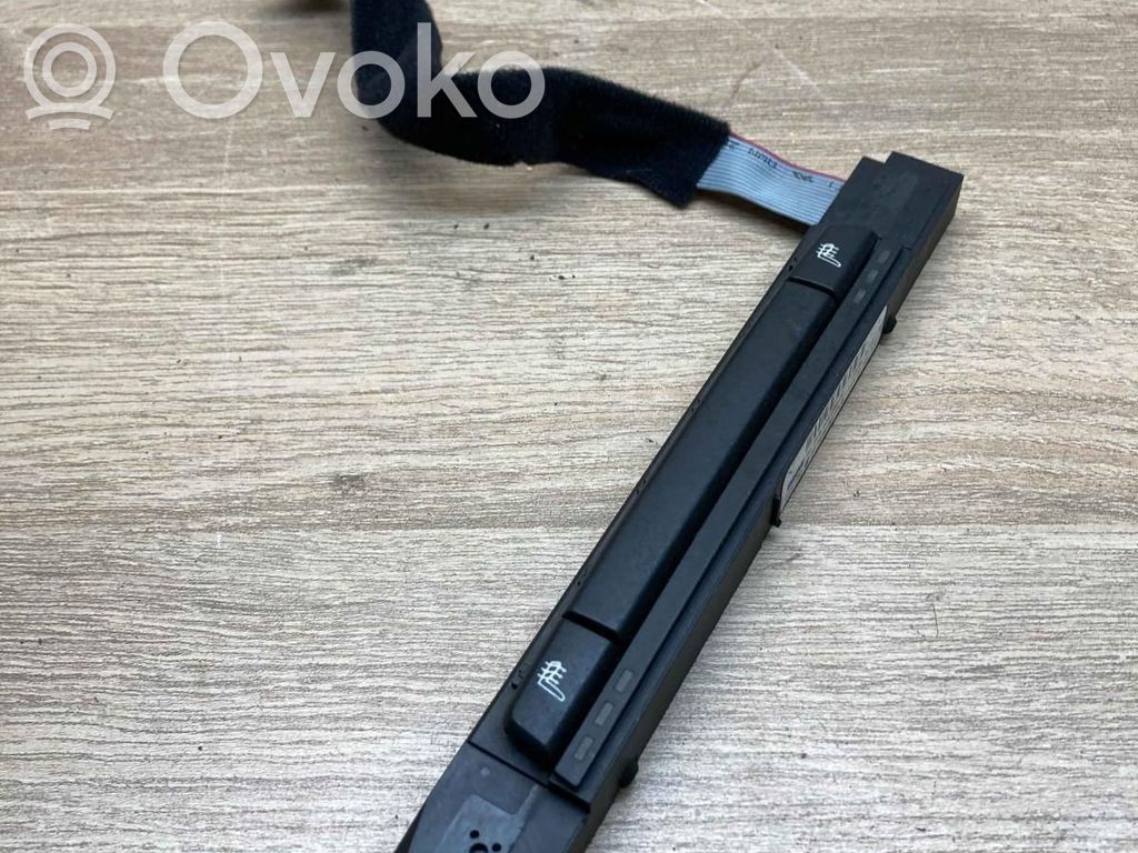 Seat heating switch   6949258,03743630