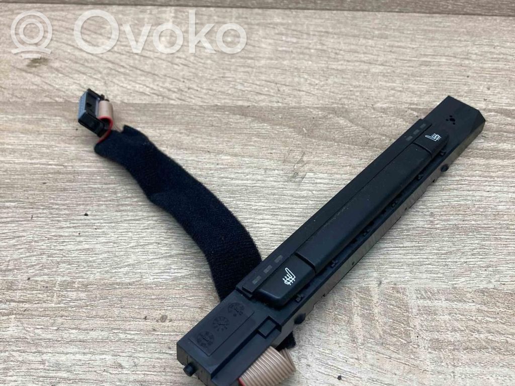 Seat heating switch   6962604,03743670