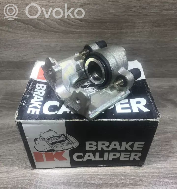 Opel Corsa B Zacisk hamulcowy przedni 