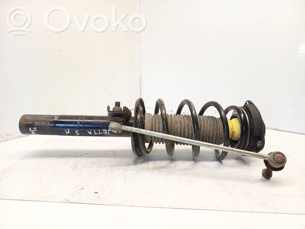Volkswagen Jetta V Amortyzator osi przedniej ze sprężyną 