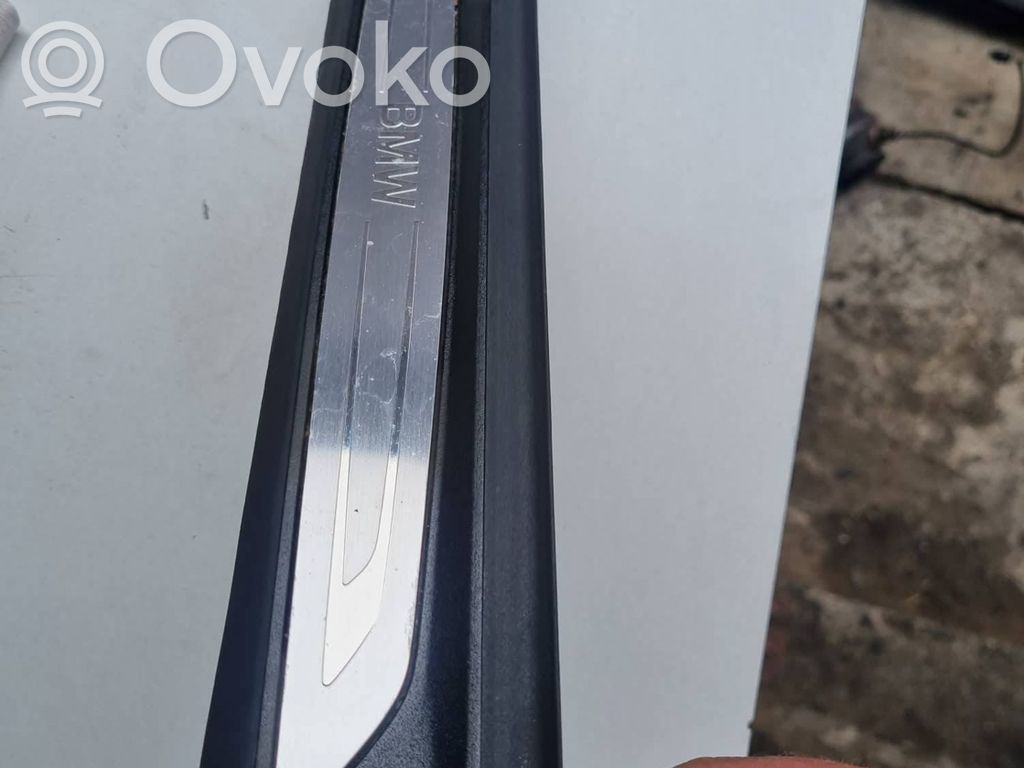 BMW 2 F46 Aizmugurējā sliekšņa dekoratīvā apdare (iekšējā) 
