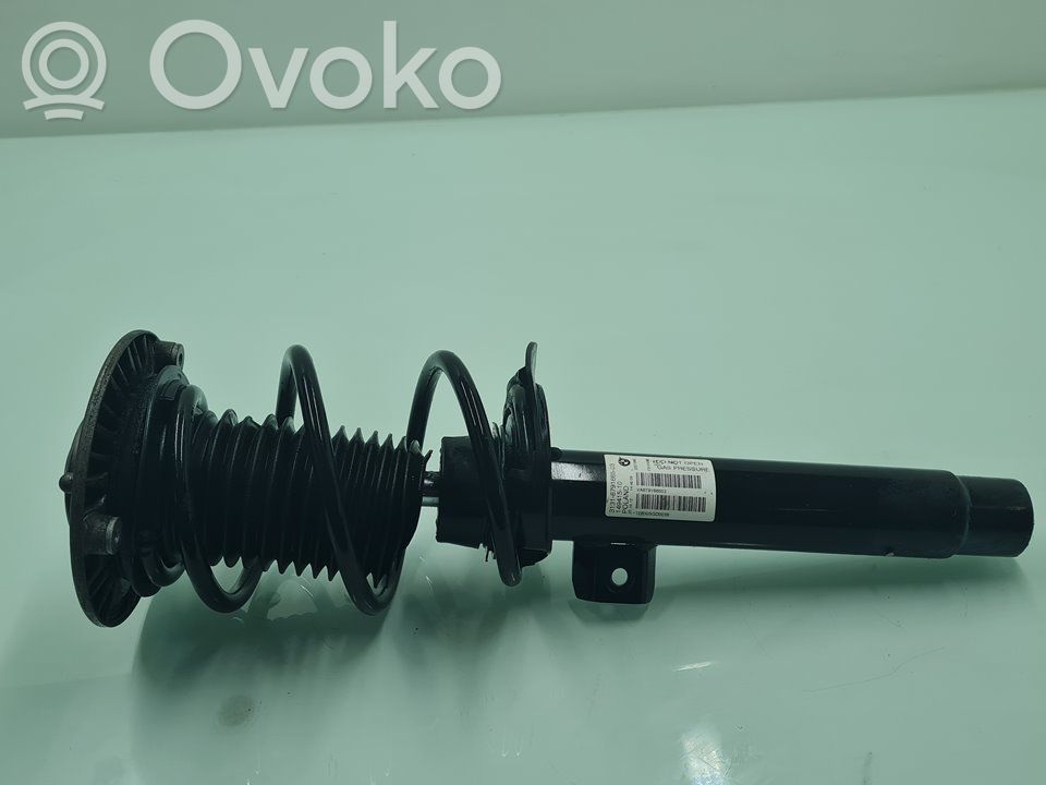 Front shock absorber with coil spring   6791665