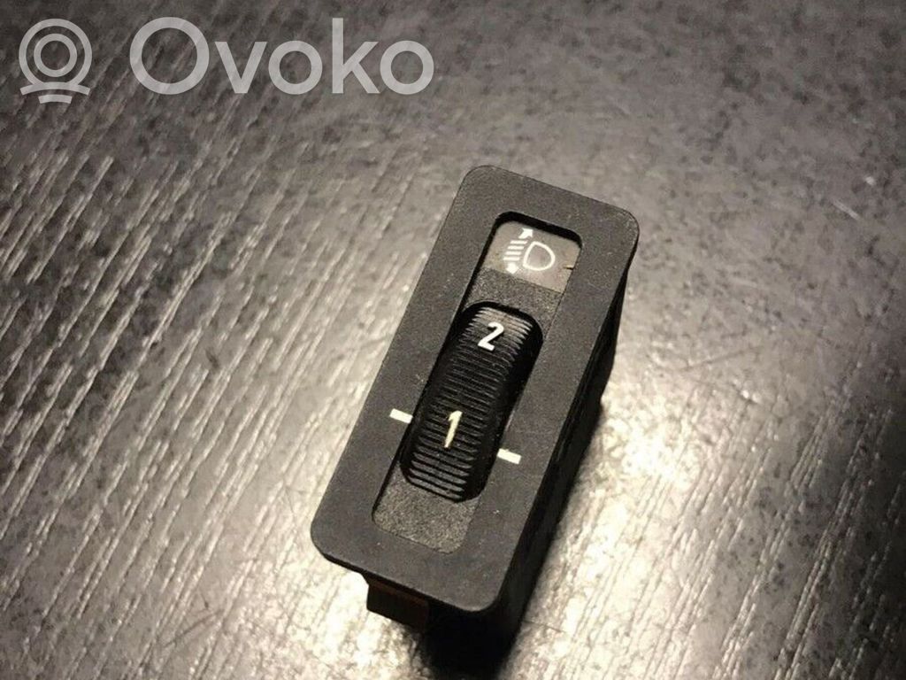 Headlight level height control switch   1387072