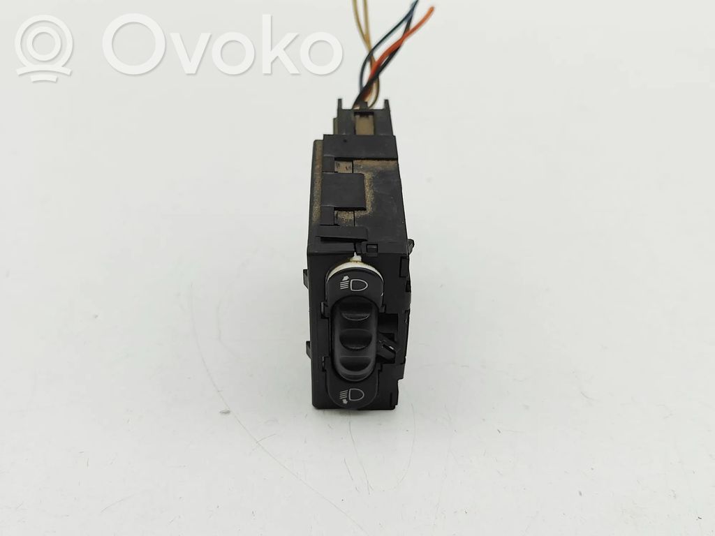 Headlight level height control switch   7700841235