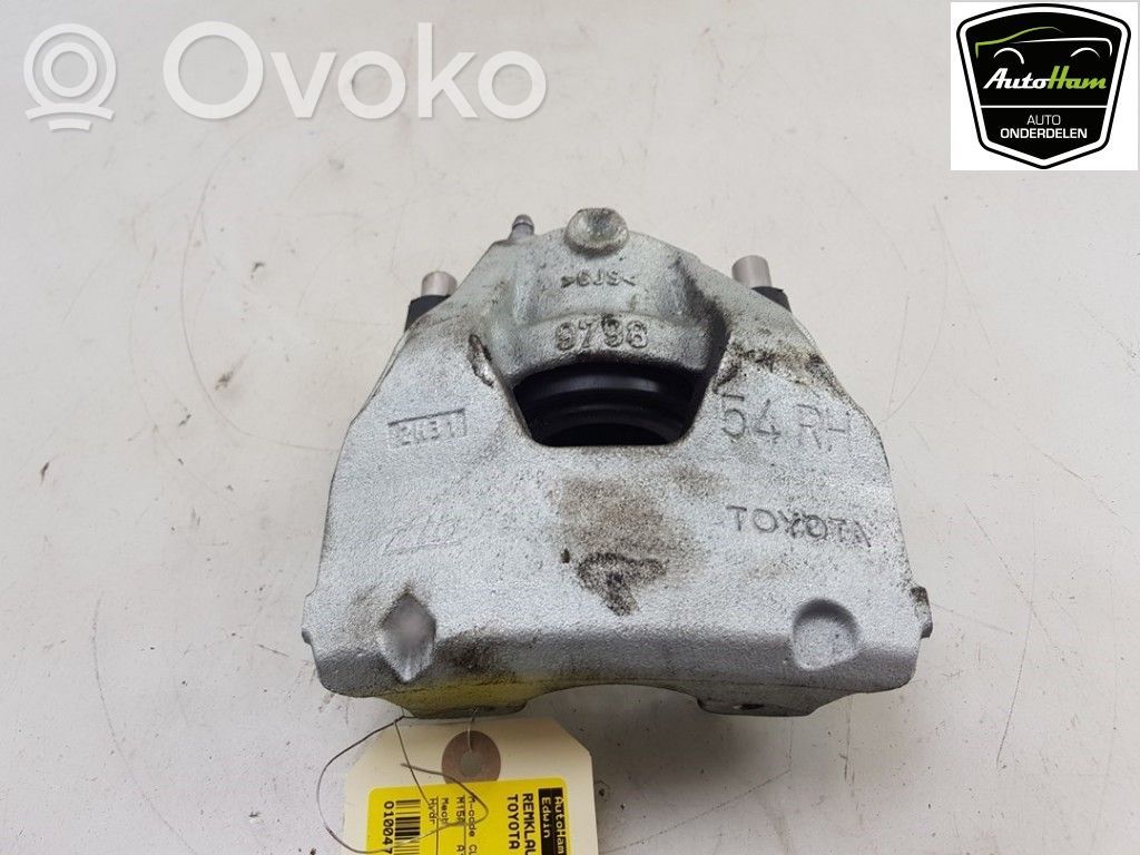 Toyota Yaris XP210 Zacisk hamulcowy przedni 