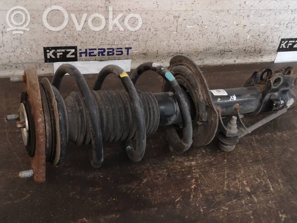 KIA Pro Cee'd II Front shock absorber with coil spring 