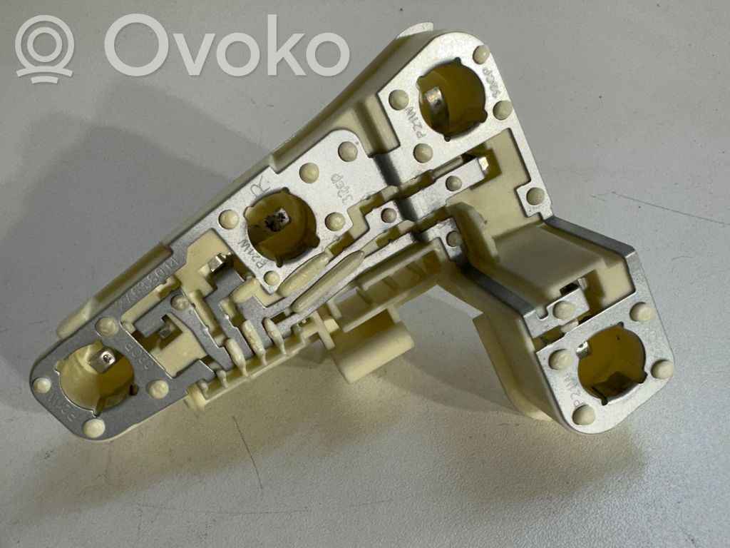 Tail light bulb cover holder   6937474