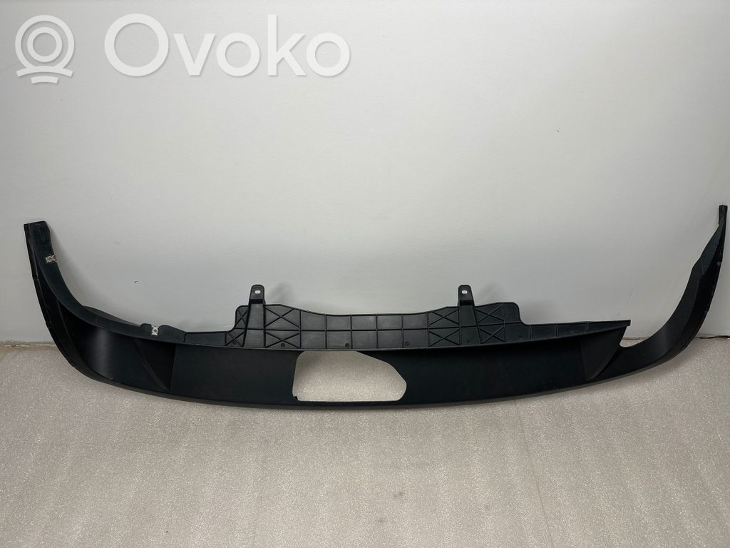 Volkswagen PASSAT B7 Moldura inferior del parachoques trasero 