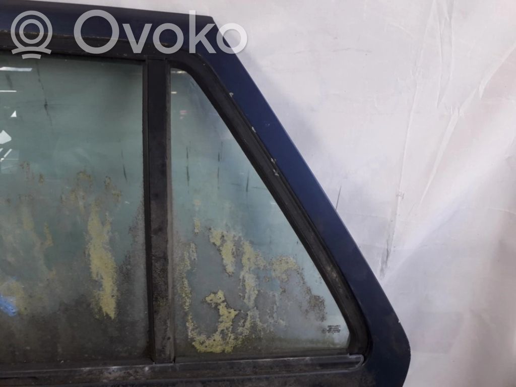 Ventanilla de ventilación de la puerta trasera