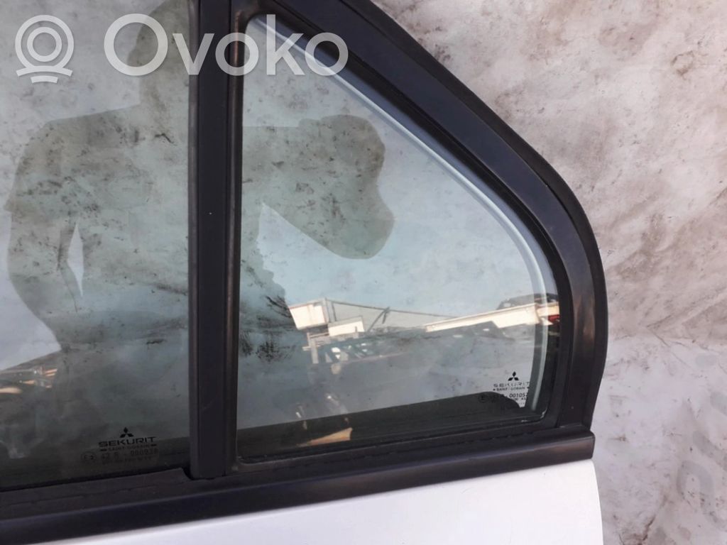Ventanilla de ventilación de la puerta trasera