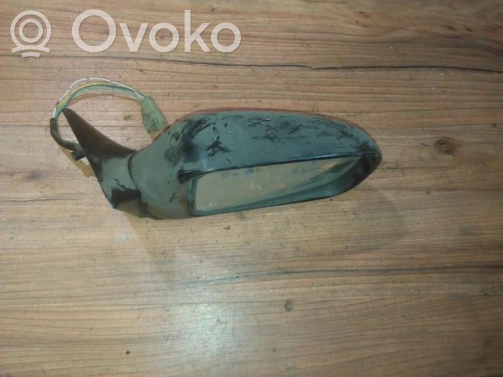 Subaru Impreza I Specchietto retrovisore elettrico portiera anteriore 