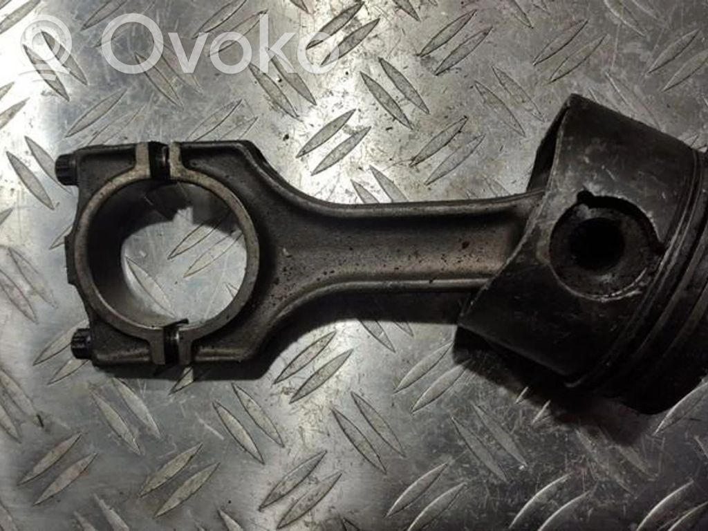 Piston with connecting rod