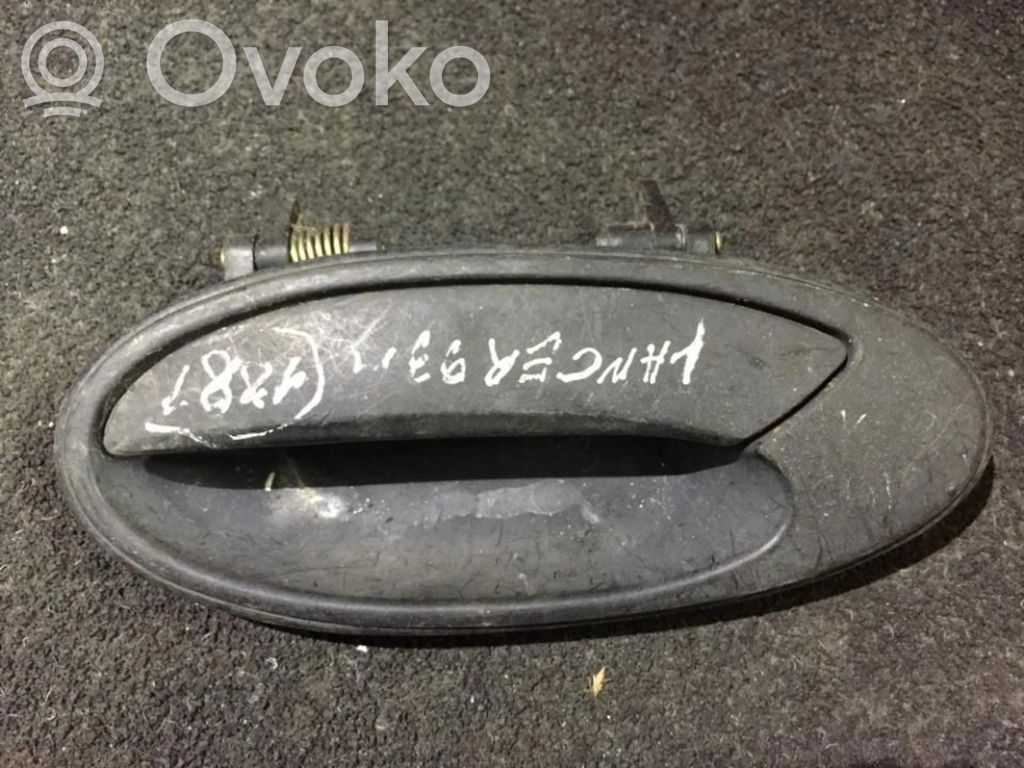 Mitsubishi Lancer Manecilla externa puerta delantera 