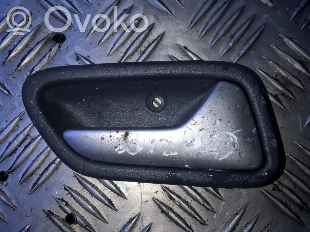 Suzuki Liana Manecilla interna puerta trasera