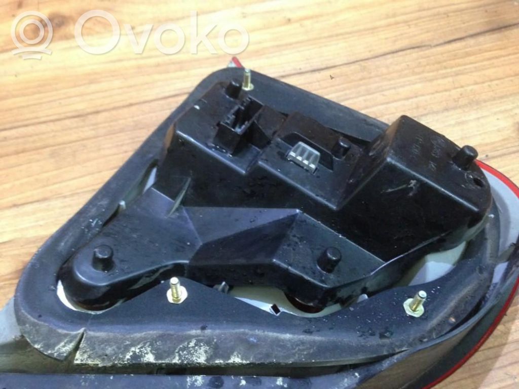 Rover 75 Takavalon polttimon suojan pidike 