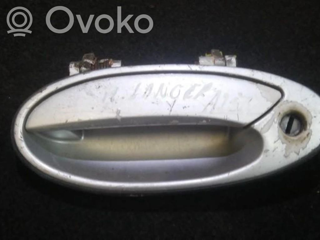 Mitsubishi Lancer Manecilla externa puerta delantera 