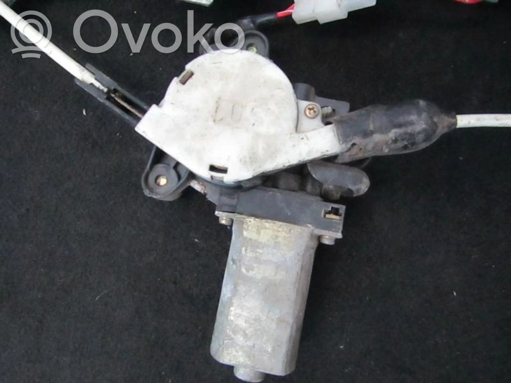 Mazda 323 Silnik regulatora szyby drzwi przednich 
