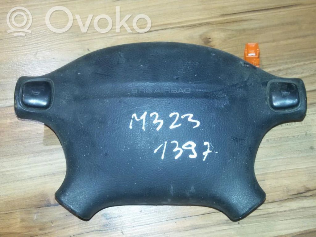 Mazda 323 Vairo oro pagalvė 