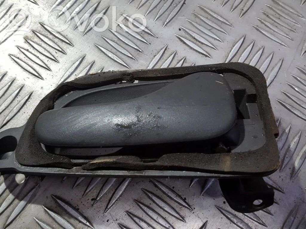Mâner interior ușă spate   7700816565,7700816565
