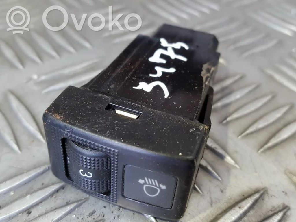 Headlight level height control switch