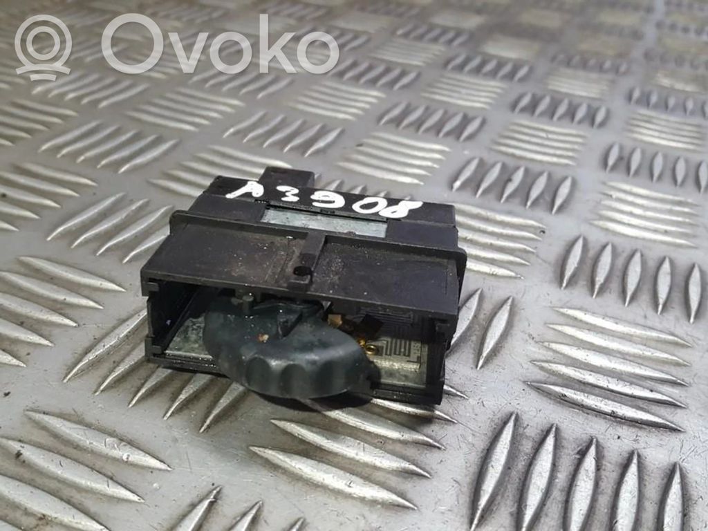 Renault Megane I Interruttore di regolazione livello altezza dei fari 