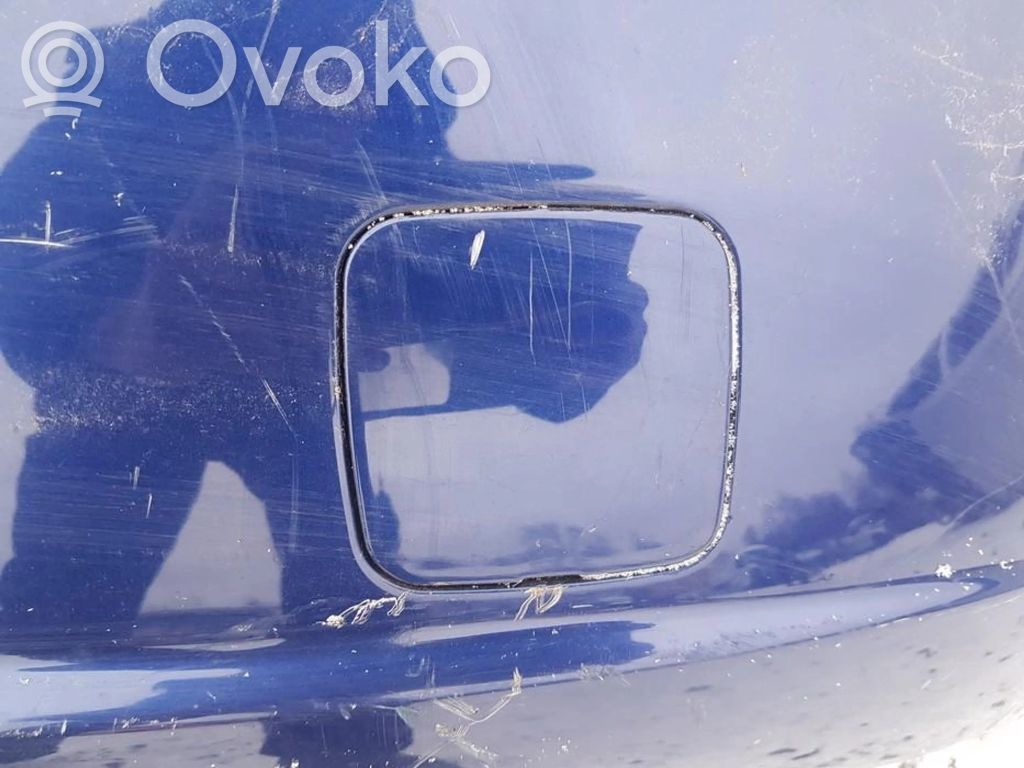 Nissan Almera N16 Cache crochet de remorquage arrière